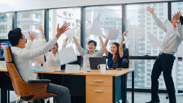 millennial-group-young-businesspeople-asia-businessman-businesswoman-throwing-documents-feeling-happy-achievements-after-succeed-result-meeting-room-small-modern-office-urban-city_7861-2500