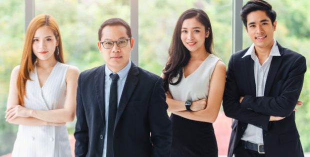 asian-business-team-standing-portrait-successful-company-workers_39730-1308