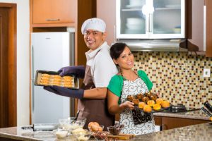 asian-couple-baking-cake-home-kitchen_79405-8456