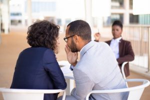 employees-gossiping-about-young-female-colleague_1262-21032