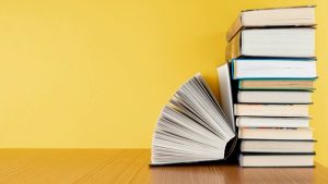 front-view-pile-books-with-copy-space_23-2148255858