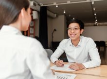 young-asian-businessman-job-interview-with-woman-office_97712-242
