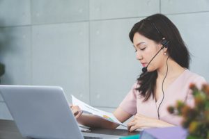 young-asian-businesswoman-headphones-with-computer-having-online-vdo-conference-meeting_36984-320